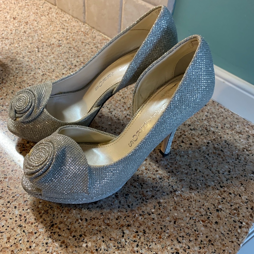 Silver high heels.  6.5